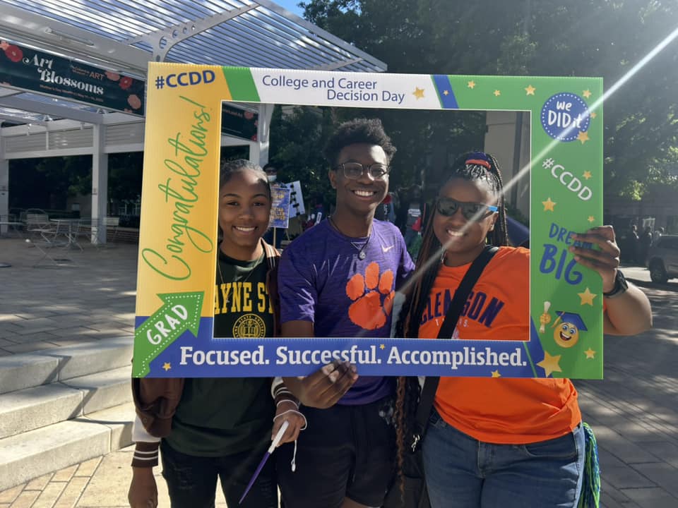 Students celebrate their upcoming college plans.